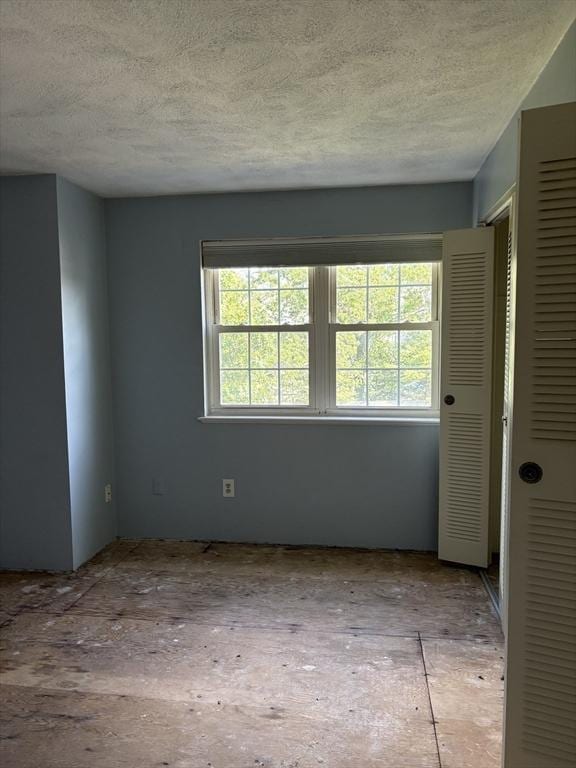 740 Central St Unit J11, Leominster, MA 01453 - unfurnished room featuring a textured ceiling