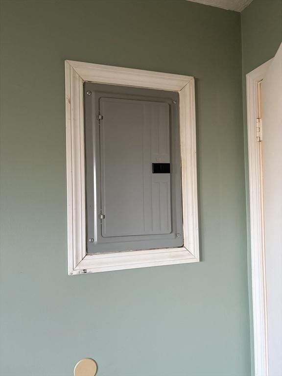 740 Central St Unit J11, Leominster, MA 01453 - detailed view of electric panel and stucco siding
