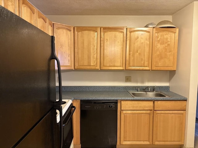 740 Central St Unit J11, Leominster, MA 01453 - kitchen featuring black appliances, dark countertops, and a textured ceiling