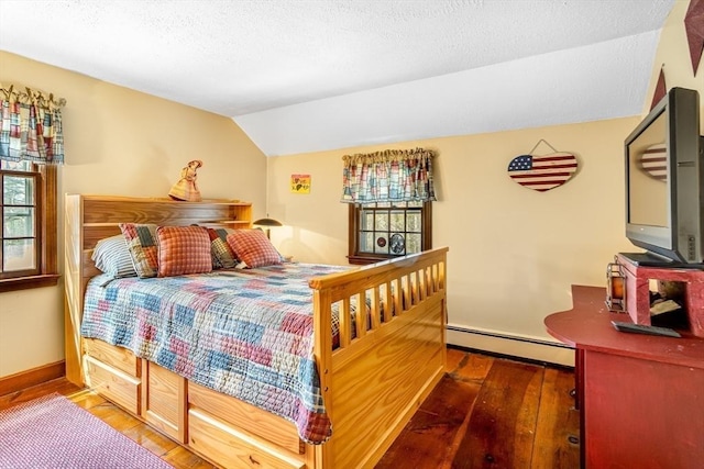 bedroom featuring lofted ceiling, hardwood / wood-style floors, baseboards, a textured ceiling, and a baseboard radiator