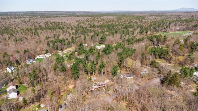 aerial view featuring a forest view