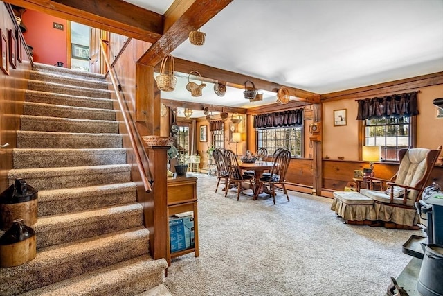 interior space with stairs and beam ceiling