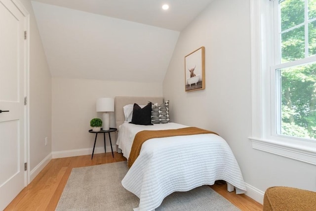 12 Cuba St Unit 12, Watertown, MA 02472 - bedroom featuring light wood finished floors, lofted ceiling, and recessed lighting