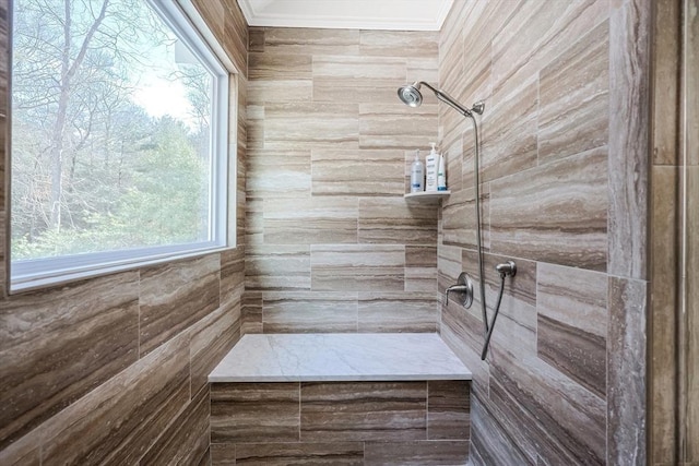 bathroom featuring tiled shower