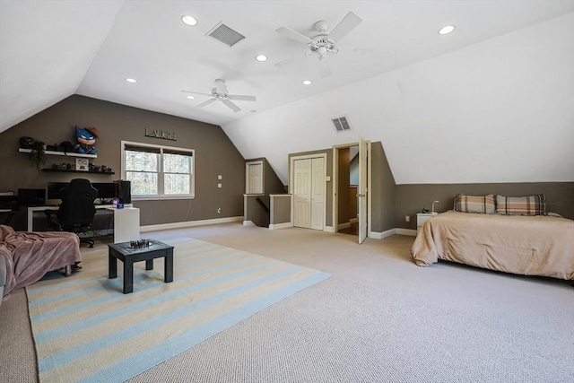 bedroom with lofted ceiling, light colored carpet, and ceiling fan