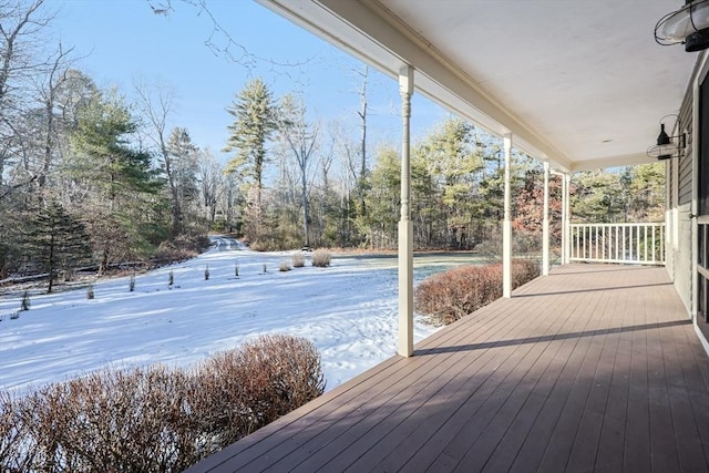 wooden terrace with a porch