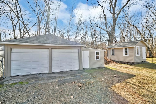 garage featuring a yard