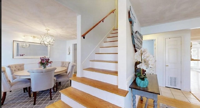 32 Nelson Ave, Beverly, MA 01915 - staircase with an inviting chandelier and visible vents