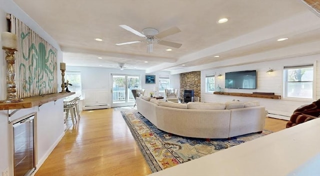 32 Nelson Ave, Beverly, MA 01915 - living area featuring a ceiling fan, wine cooler, a baseboard radiator, recessed lighting, and light wood-style floors