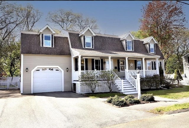 32 Nelson Ave, Beverly, MA 01915 - colonial inspired home with a porch, fence, driveway, a garage, and a shingled roof