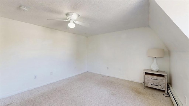 32 Nelson Ave, Beverly, MA 01915 - interior space featuring a textured ceiling, baseboard heating, ceiling fan, light colored carpet, and vaulted ceiling