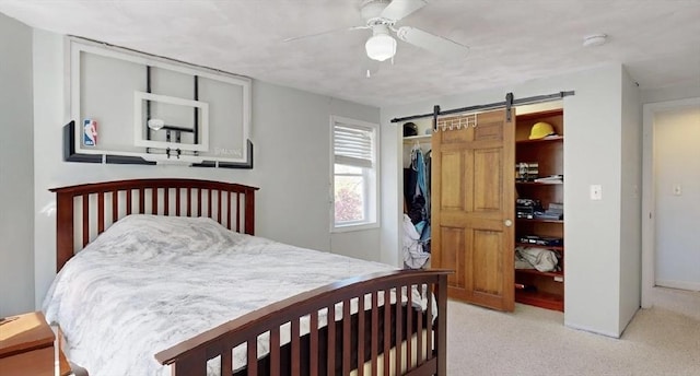 32 Nelson Ave, Beverly, MA 01915 - bedroom featuring light colored carpet, a closet, a barn door, and ceiling fan