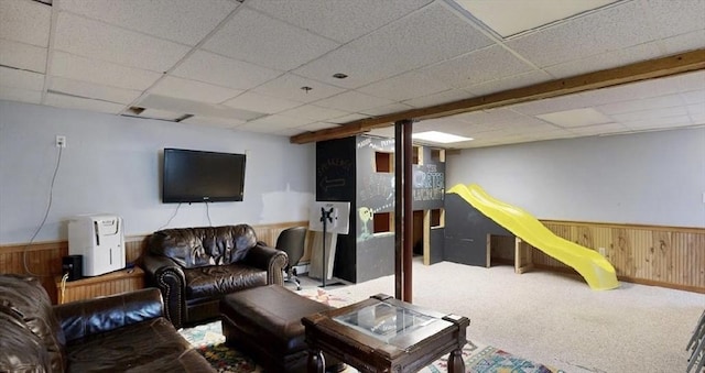 32 Nelson Ave, Beverly, MA 01915 - living room with wainscoting, wood walls, carpet, and a drop ceiling