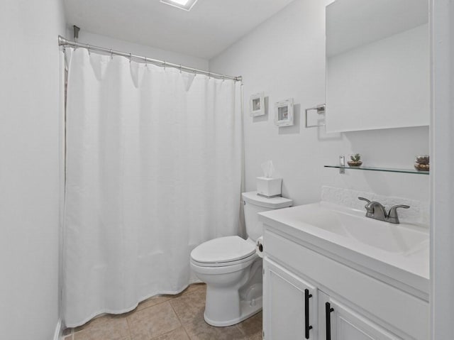 bathroom featuring toilet, tile patterned floors, a shower with shower curtain, and vanity
