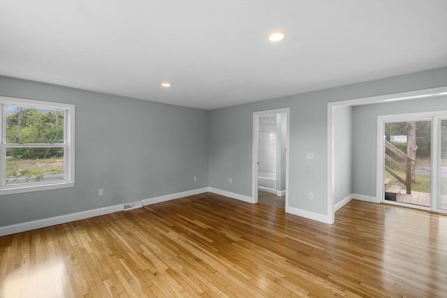 67 Great Neck Rd, Wareham, MA 02571 - unfurnished room featuring healthy amount of natural light, wood finished floors, baseboards, and recessed lighting