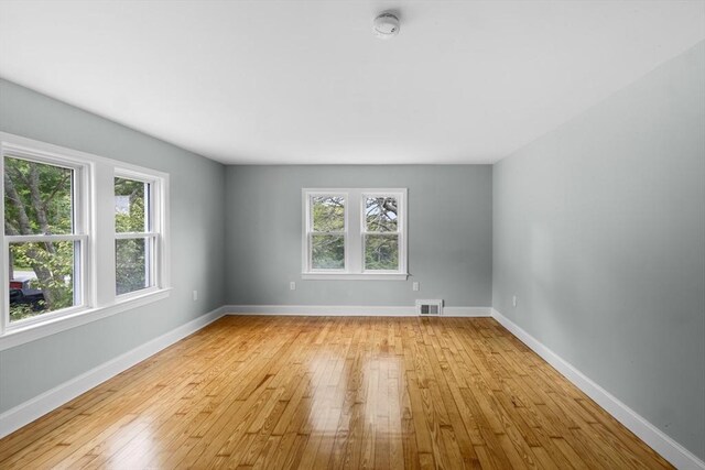 67 Great Neck Rd, Wareham, MA 02571 - empty room featuring light wood-style flooring, baseboards, and a smoke detector
