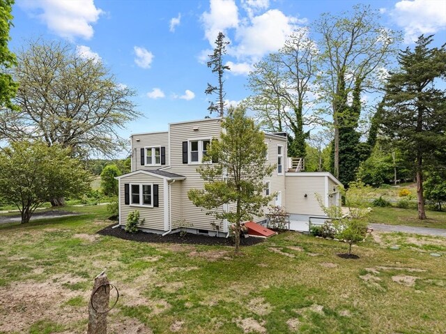 67 Great Neck Rd, Wareham, MA 02571 - back of house with a lawn