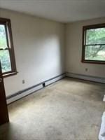 spare room with a baseboard radiator