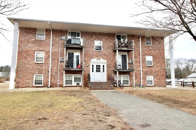 view of front of home featuring brick siding