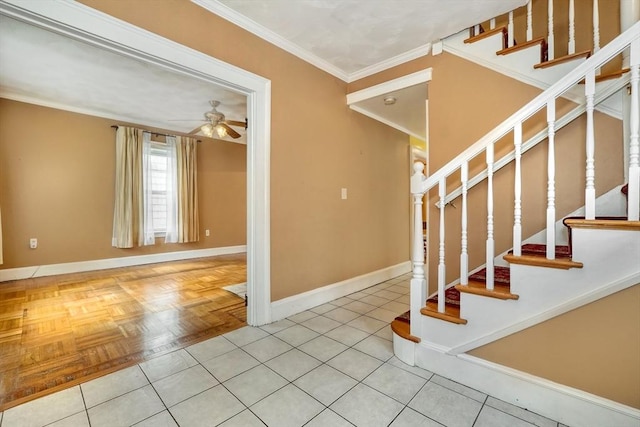 10 Windom St, Boston, MA 02134 - staircase with ornamental molding, ceiling fan, baseboards, and tile patterned floors