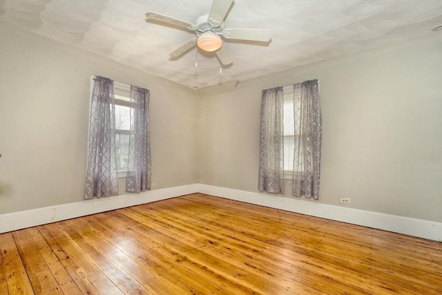 10 Windom St, Boston, MA 02134 - unfurnished room featuring wood-type flooring, ceiling fan, and baseboards
