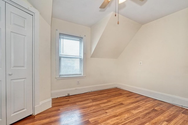 10 Windom St, Boston, MA 02134 - additional living space featuring ceiling fan, light wood finished floors, baseboards, and lofted ceiling