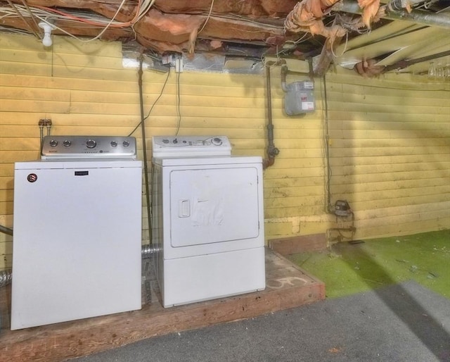 10 Windom St, Boston, MA 02134 - washroom featuring laundry area, separate washer and dryer, and wooden walls