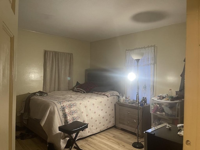 bedroom featuring light wood-type flooring