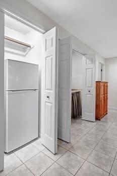 interior space with light tile patterned floors