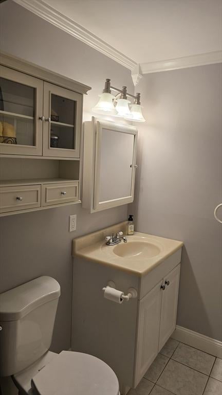 56 Edgeworth St Unit 14, Worcester, MA 01605 - bathroom featuring vanity, ornamental molding, and tile patterned floors