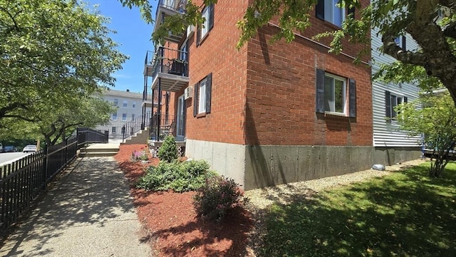 56 Edgeworth St Unit 14, Worcester, MA 01605 - view of side of property featuring brick siding