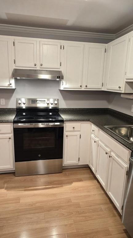 56 Edgeworth St Unit 14, Worcester, MA 01605 - kitchen featuring electric range, under cabinet range hood, and white cabinets