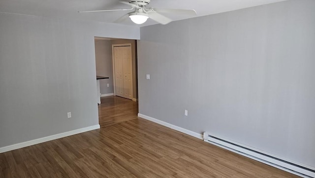 56 Edgeworth St Unit 14, Worcester, MA 01605 - spare room with a baseboard heating unit, ceiling fan, and wood finished floors
