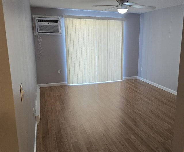 56 Edgeworth St Unit 14, Worcester, MA 01605 - unfurnished room featuring a ceiling fan, wood finished floors, and a wall unit AC