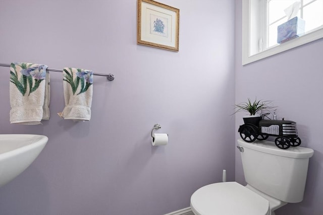 172 Orchard St, Newbury, MA 01922 - half bathroom featuring toilet and baseboards