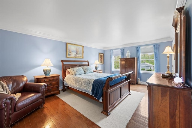 172 Orchard St, Newbury, MA 01922 - bedroom featuring ornamental molding and hardwood / wood-style floors