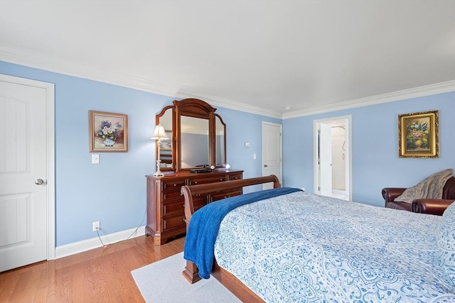 172 Orchard St, Newbury, MA 01922 - bedroom featuring wood finished floors, ornamental molding, and baseboards