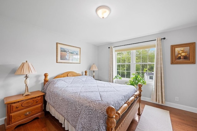 172 Orchard St, Newbury, MA 01922 - bedroom with dark wood finished floors and baseboards