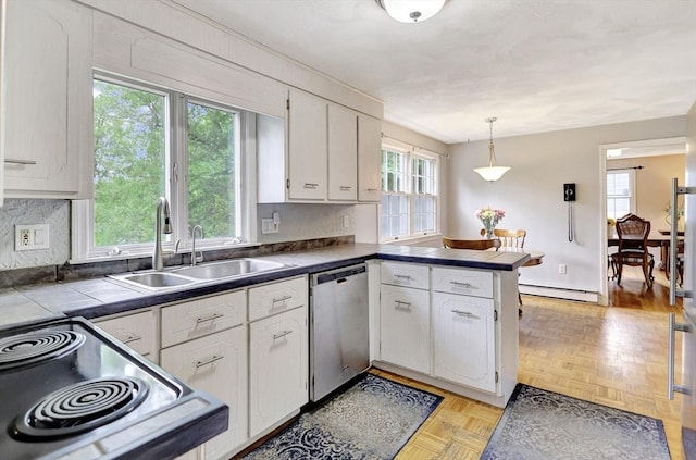 10 Emile Cir, Medford, MA 02155 - kitchen with stainless steel dishwasher, a baseboard heating unit, a sink, white cabinetry, and a peninsula