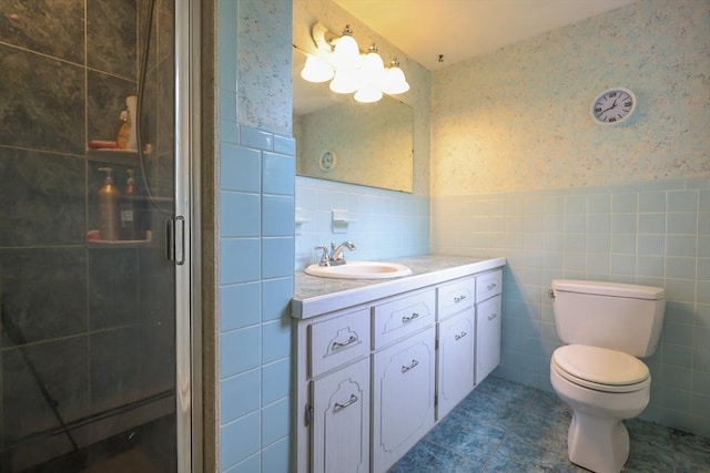 10 Emile Cir, Medford, MA 02155 - full bath featuring wallpapered walls, tile walls, vanity, wainscoting, and a shower stall