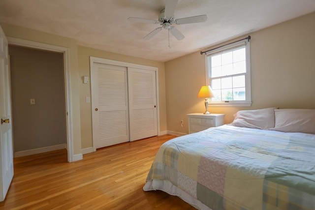 10 Emile Cir, Medford, MA 02155 - bedroom with light wood-style floors, baseboards, a closet, and a ceiling fan