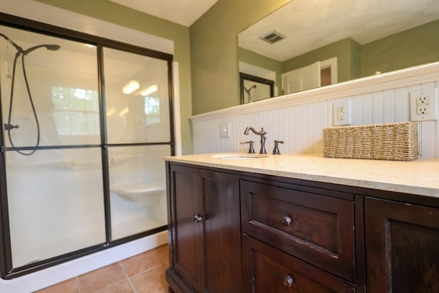 10 Emile Cir, Medford, MA 02155 - full bathroom with a stall shower, vanity, and tile patterned flooring