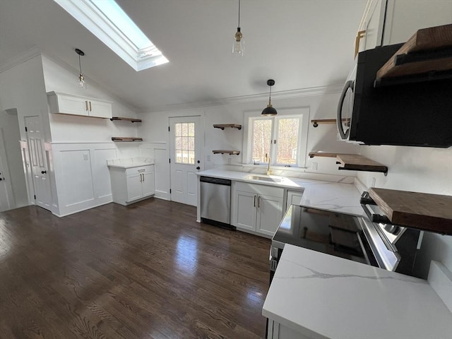 512 Lincoln St, Duxbury, MA 02332 - kitchen with open shelves, dishwasher, a skylight, black microwave, and light stone countertops
