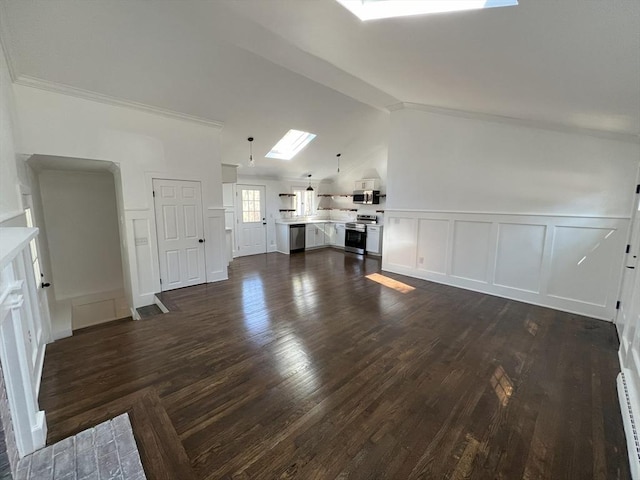 512 Lincoln St, Duxbury, MA 02332 - unfurnished living room with a decorative wall, dark wood finished floors, a skylight, ornamental molding, and vaulted ceiling
