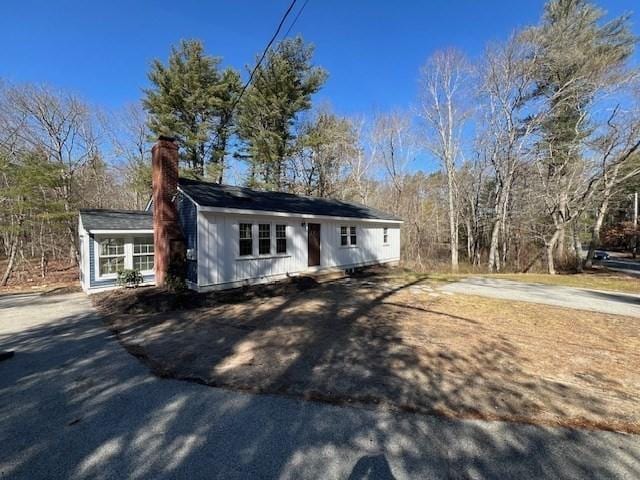 512 Lincoln St, Duxbury, MA 02332 - ranch-style house with a chimney and driveway