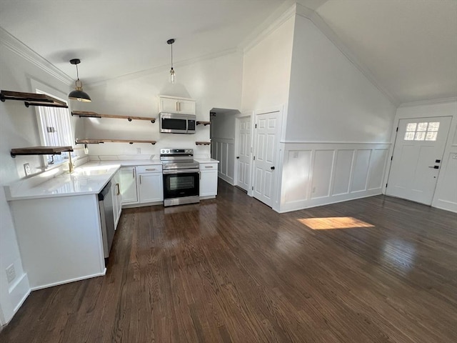 512 Lincoln St, Duxbury, MA 02332 - kitchen with stainless steel appliances, open shelves, vaulted ceiling, ornamental molding, and decorative light fixtures