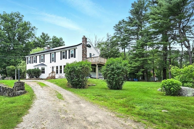 23 Westboro Rd, Upton, MA 01568 - view of front facade with a chimney, dirt driveway, and a front lawn