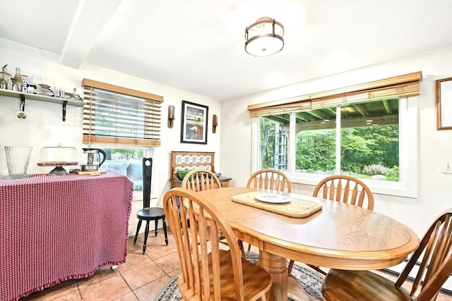 23 Westboro Rd, Upton, MA 01568 - dining area with light tile patterned floors and beam ceiling