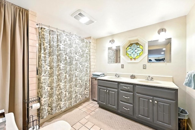 23 Westboro Rd, Upton, MA 01568 - full bath featuring double vanity, tile patterned flooring, and a shower with curtain