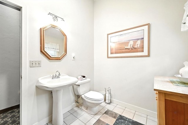 23 Westboro Rd, Upton, MA 01568 - bathroom with toilet and tile patterned flooring